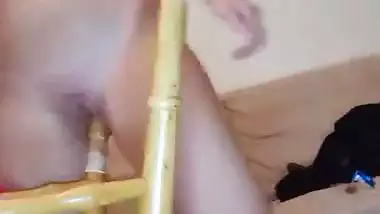 Crazy girl uses chair leg as a sex toy to fuck her pussy